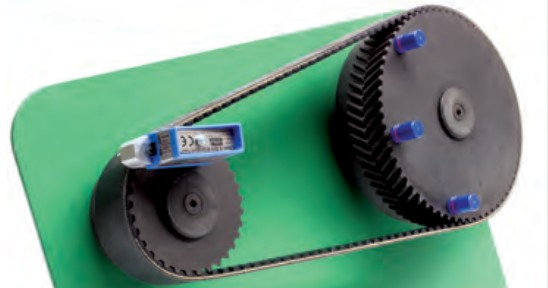 SIT LINE-LASER pulley alignment tool mounted on a synchronous belt drive with three control targets on the driven pulley
