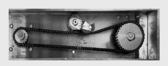 SIT TA automatic chain tensioner with sprocket installed on a roller chain drive